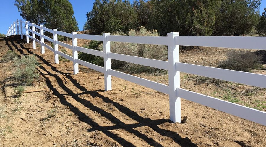 White vinyl fence erected in the High Desert area, California